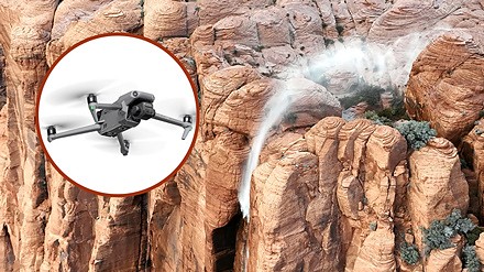 Resisting 96kmph strong wind! Aerial photography of reverse flow waterfall on the cliff with drone- DCFever.com